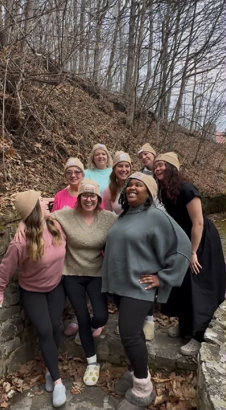 Women embracing at a faith retreat
